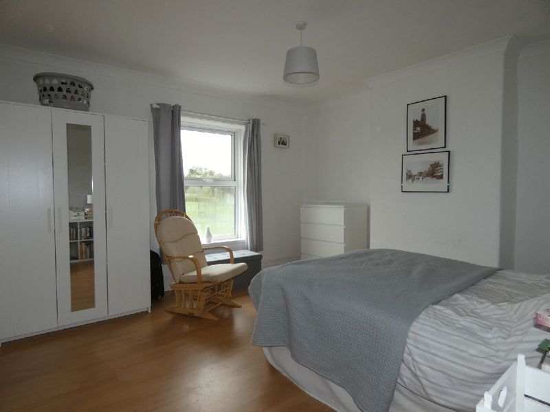 Bedroom One- click for photo gallery